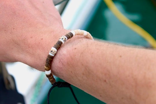 Coco shell bracelet with dyed bead accents styled view