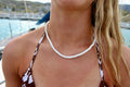 White puka shell necklace with natural clam shells