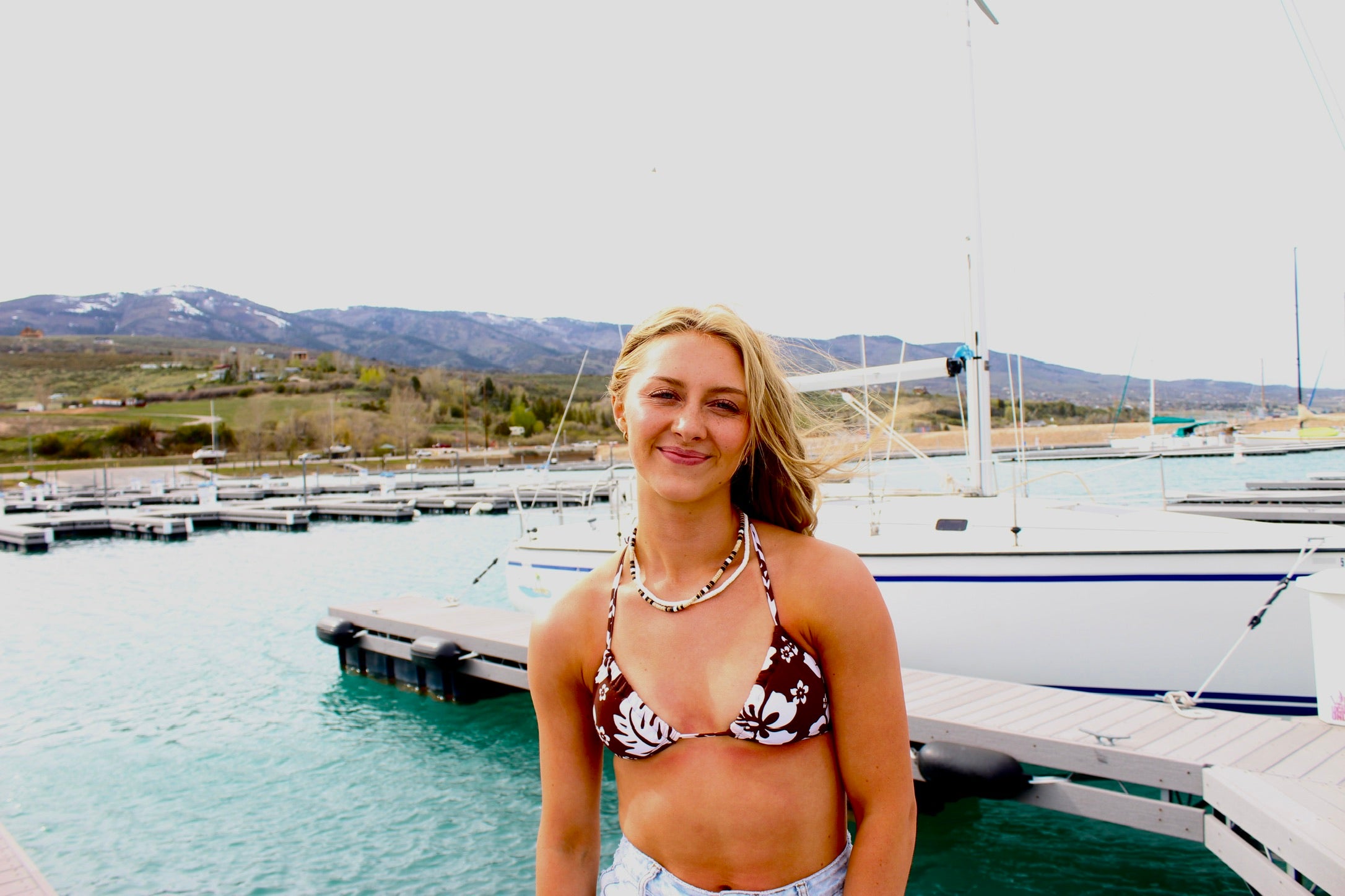 White puka shell necklace with natural clam shells product view