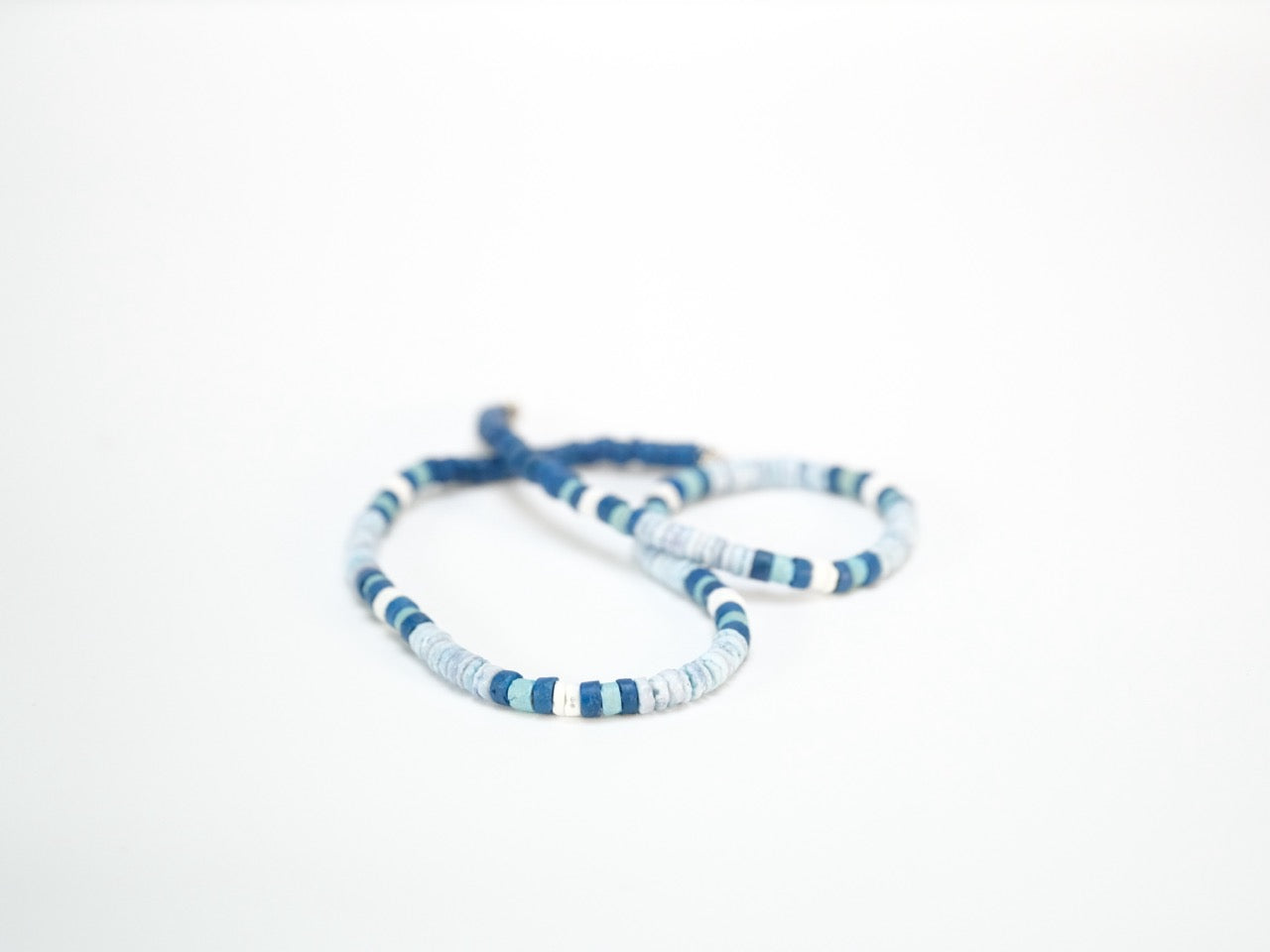Coco shell necklace with dyed natural beads close-up