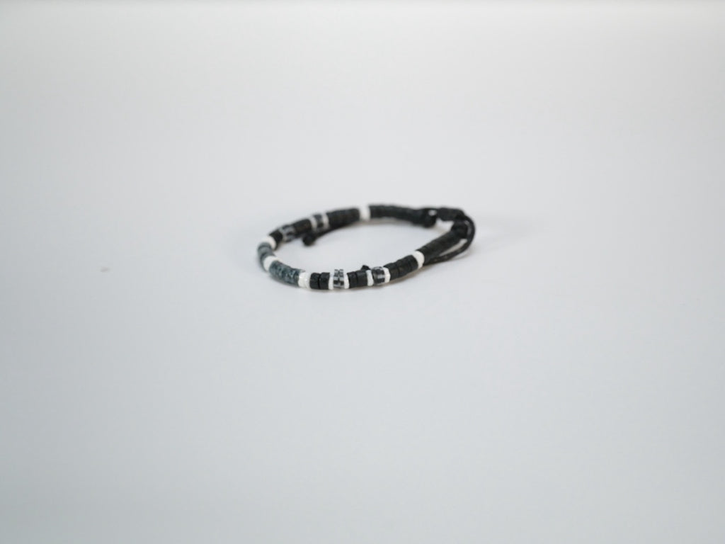 Coco shell bracelet with dyed bead accents close-up