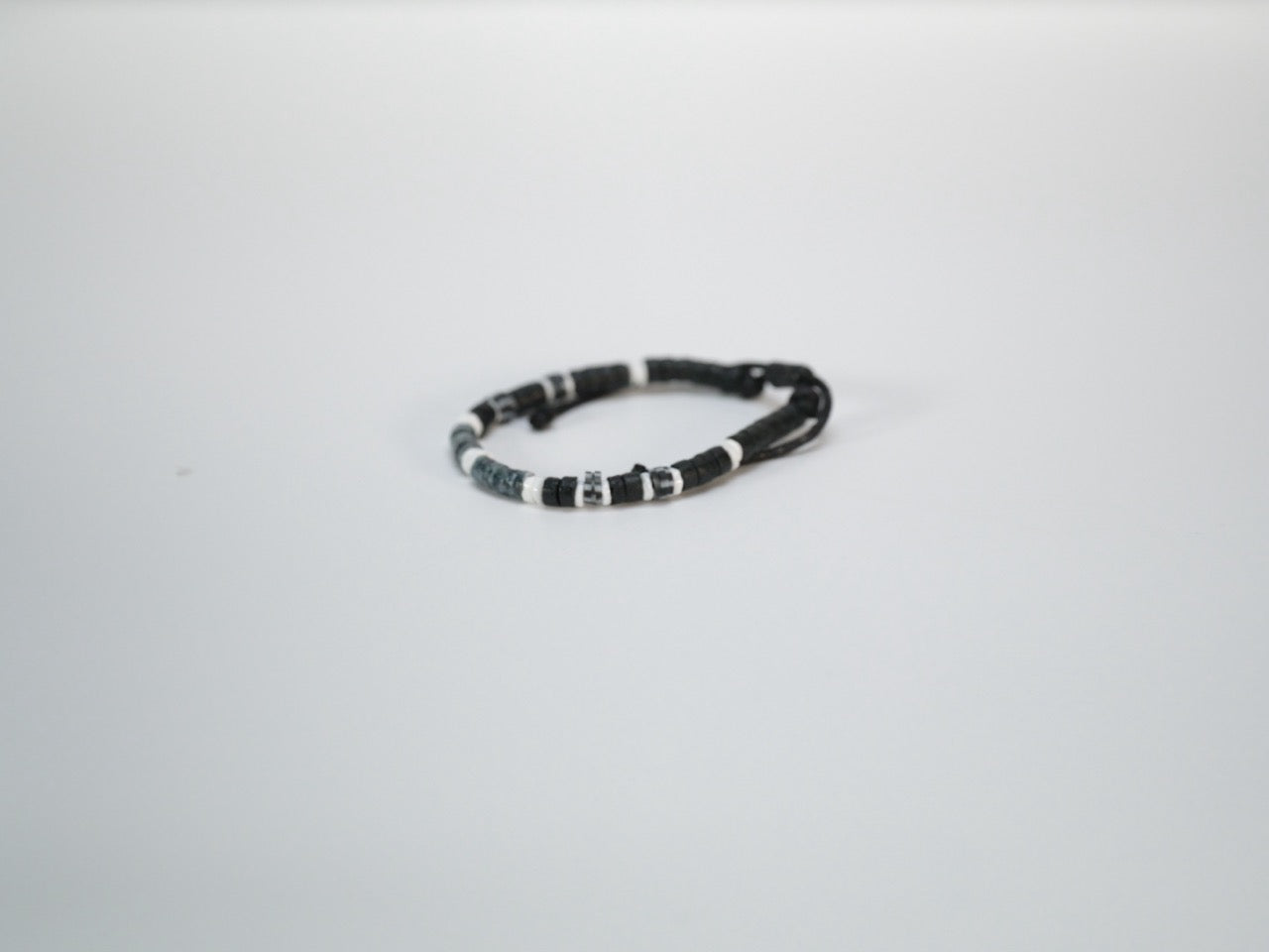 Coco shell bracelet with dyed bead accents close-up