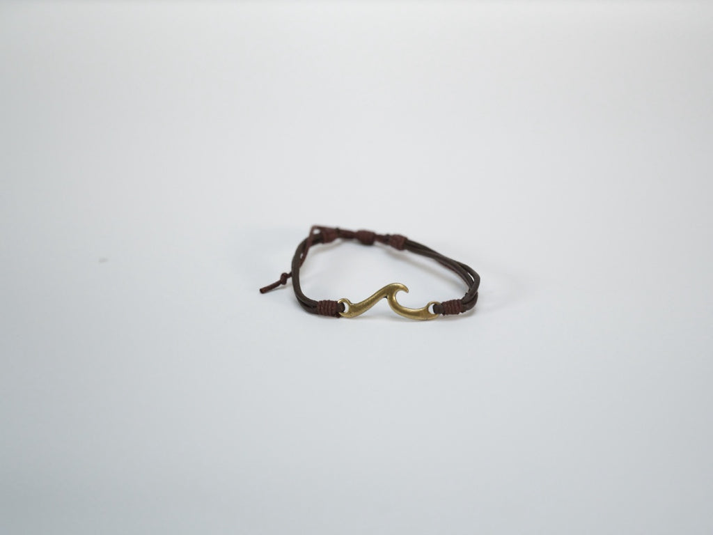 Wave leather bracelet for coastal style laid flat