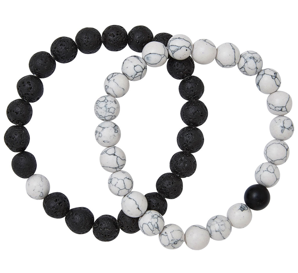 Black lava bead bracelet with white stone accents detail view